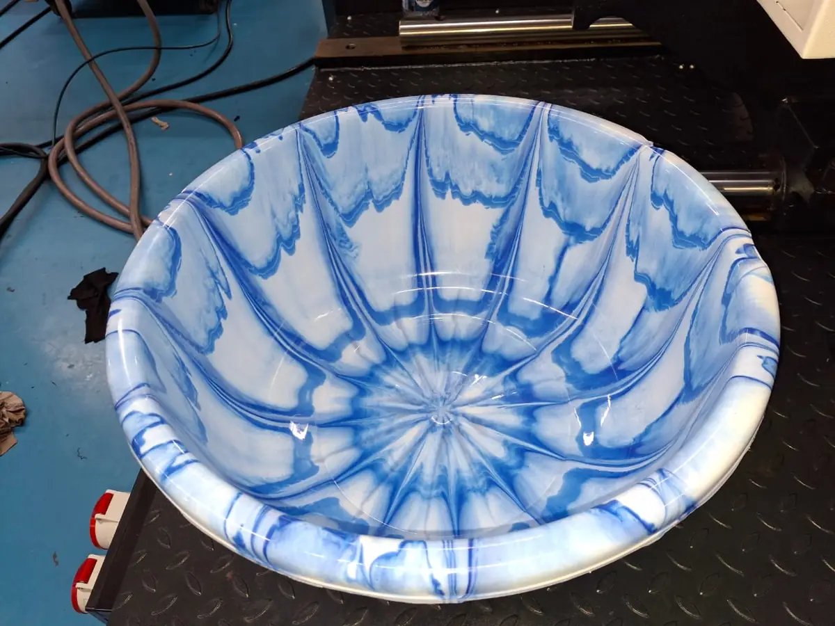 Blue and white marble effect plastic bowl made with a two colour attachment