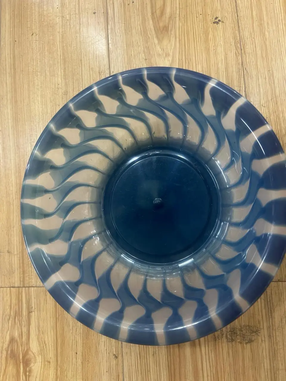 Teal swirl pattern plastic bowl, two colour injection moulded